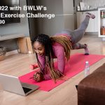 Woman with braids working out at home
